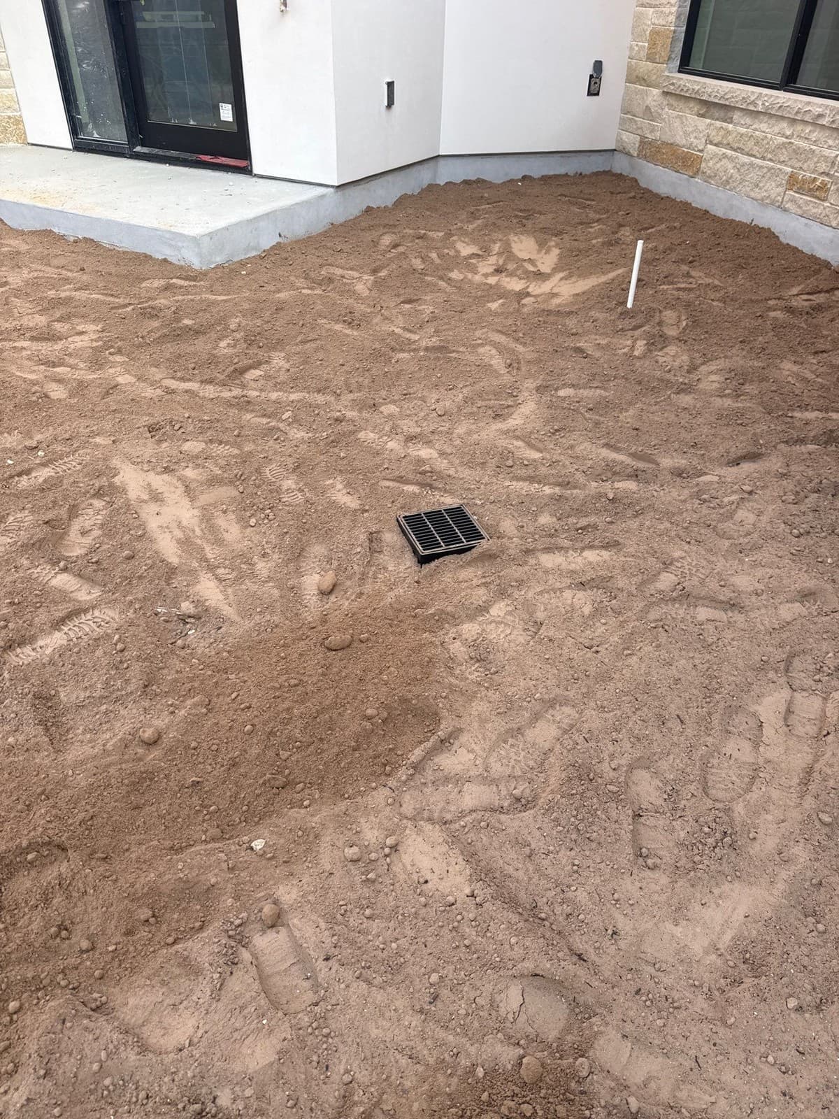 Landscape estimating software showing drainage system line items with catch basin, pipe, and outlet costs