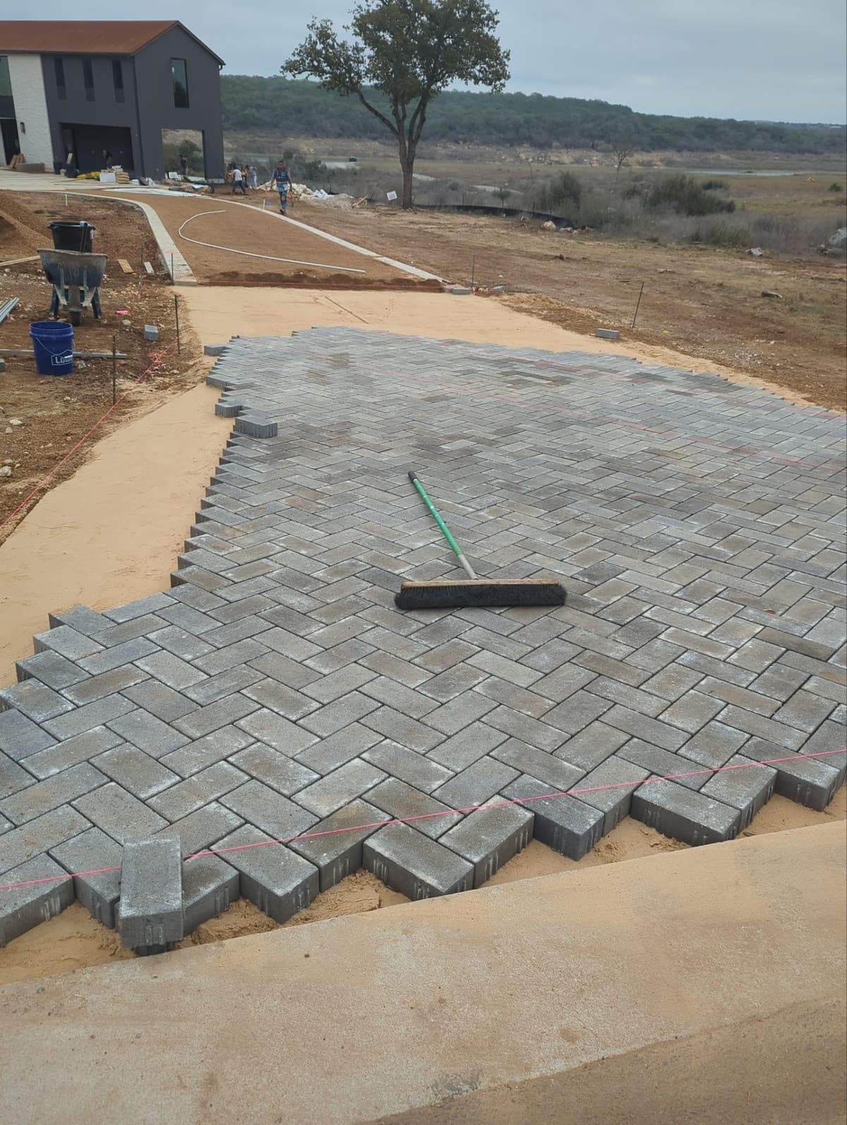 Landscape contract deposit clause showing upfront payment percentage, due date, and refund terms