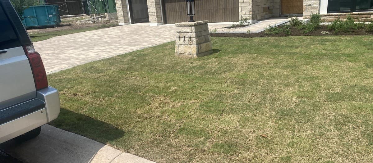 Natural turf installation estimating — soil prep, grading, sod quantity, and installation labor costs