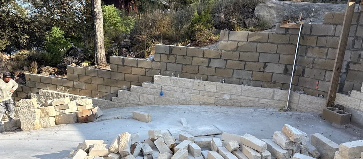 Retaining wall cost estimating — block count, base, drainage, backfill, and labor per linear foot
