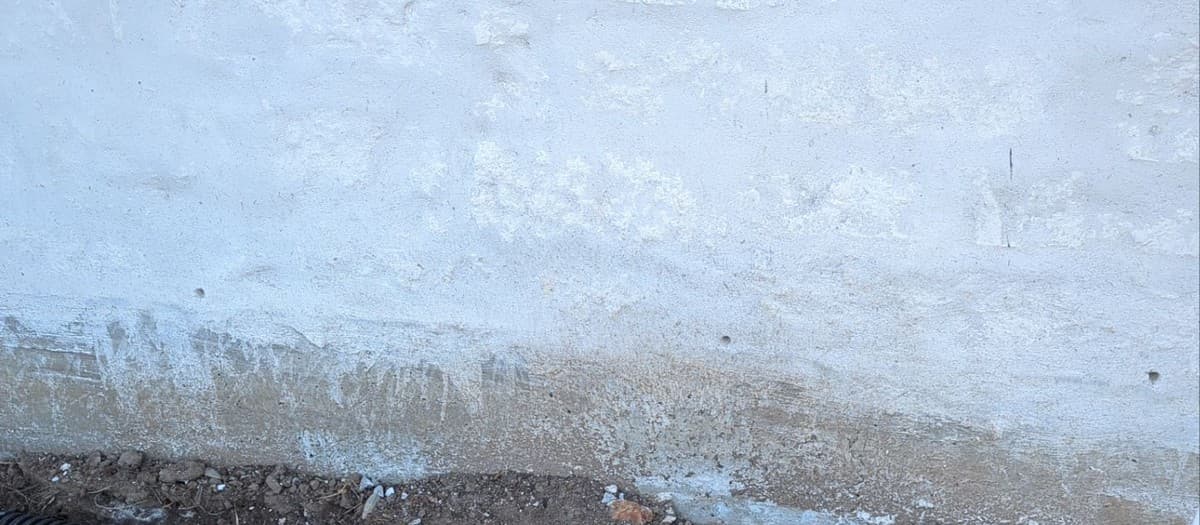 French drain pricing — trench, pipe, aggregate, fabric, and labor cost per linear foot
