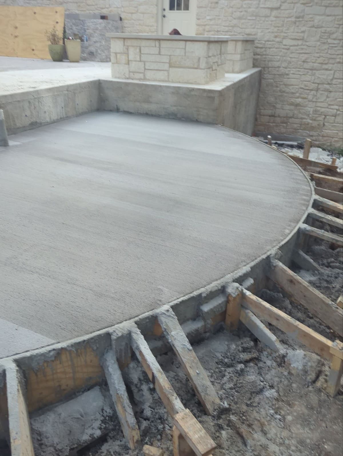 Concrete flatwork pricing breakdown showing formwork, rebar, pour, finish, and sealer line items