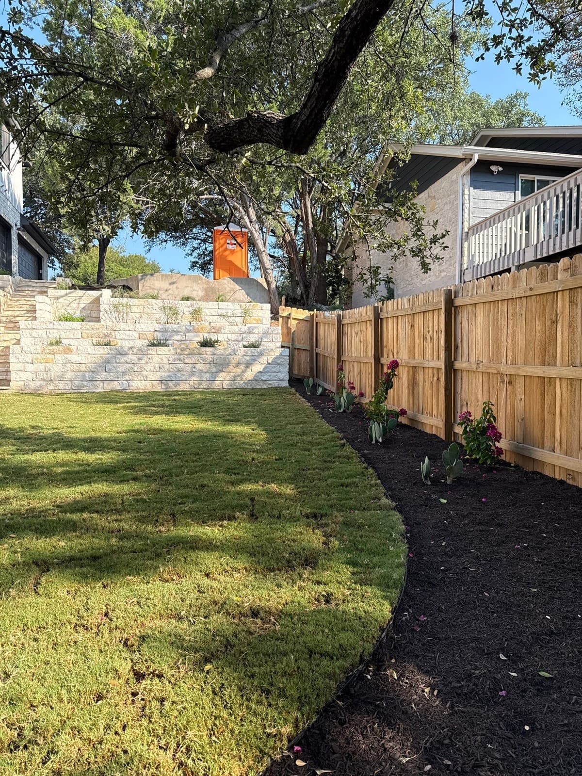 Wood fence pricing breakdown showing post setting, frame, pickets, and per-linear-foot cost by style