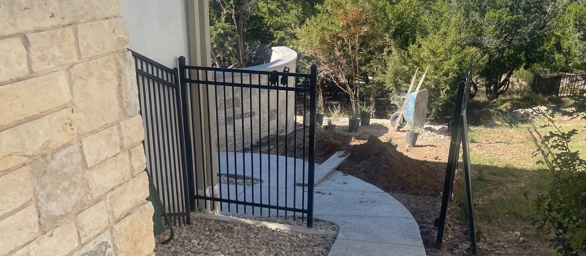 Steel gate installation that swings true — hinge placement, post setting, and adjustment for square frame