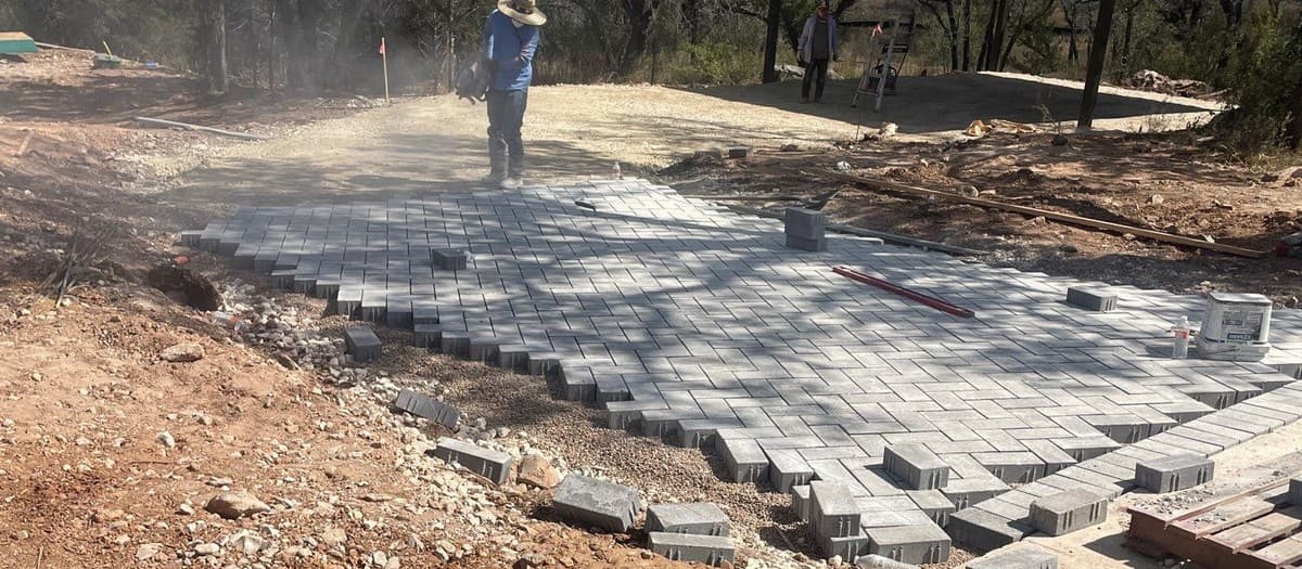 Landscape production rates by crew — paver, wall, planting, and grading output benchmarks per day