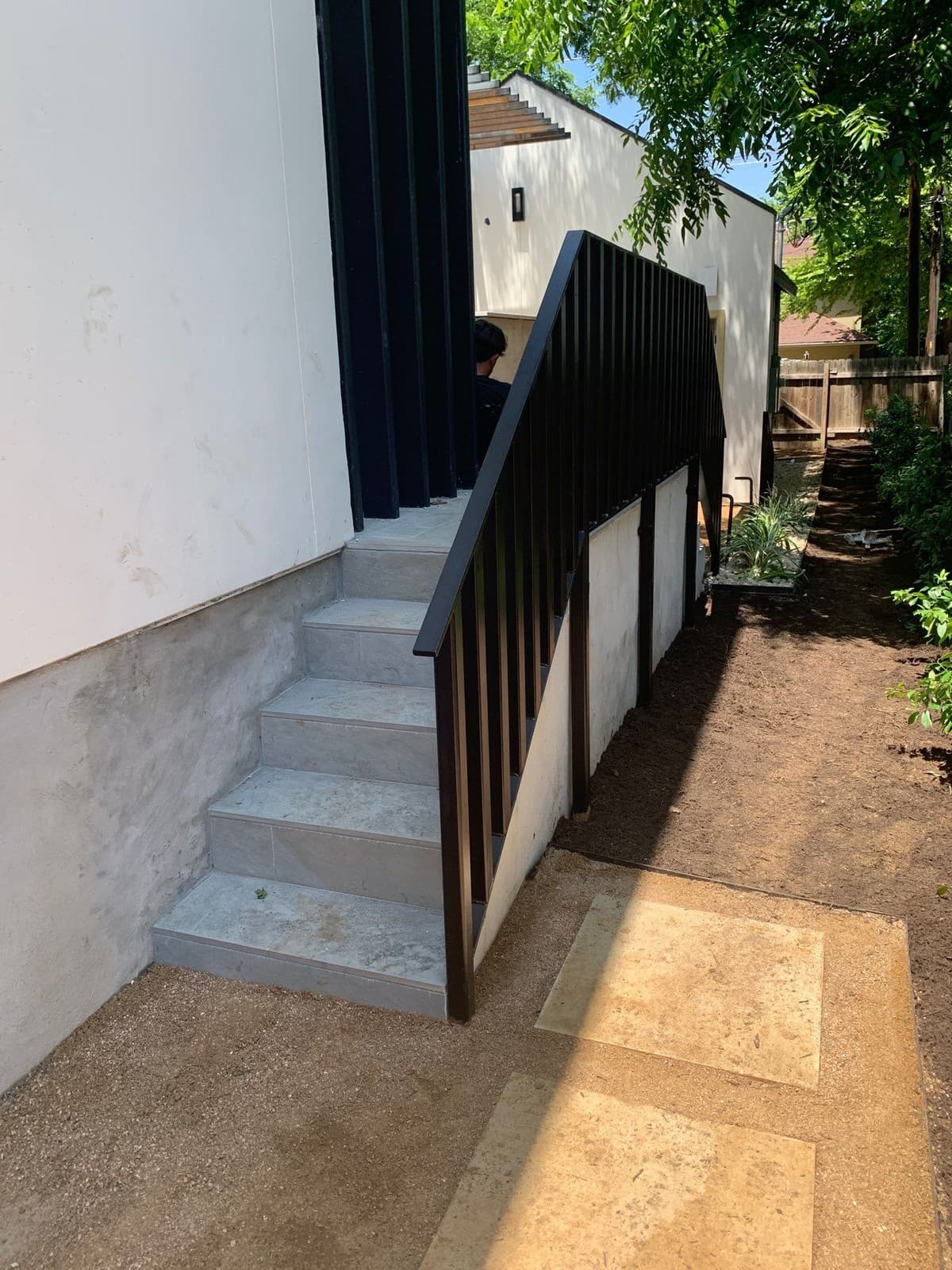 Outdoor stair construction comparison showing concrete poured, steel stringer, and wood tread assembly