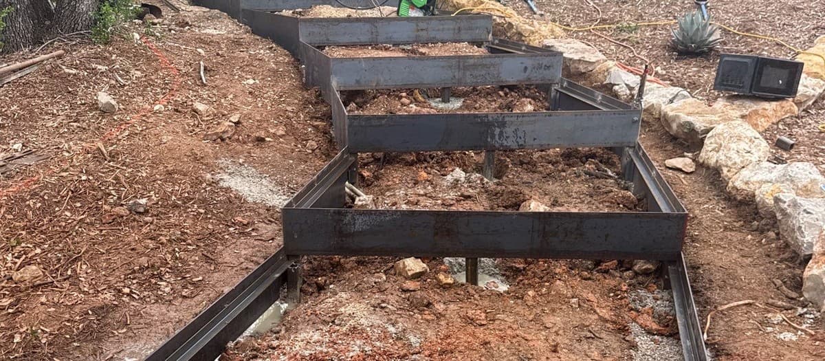 Outdoor stair construction guide — concrete, wood, and steel stair design, footing, and tread installation