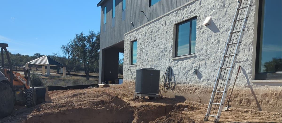 The right order to complete a landscape project — drainage, hardscape, planting, and irrigation sequence