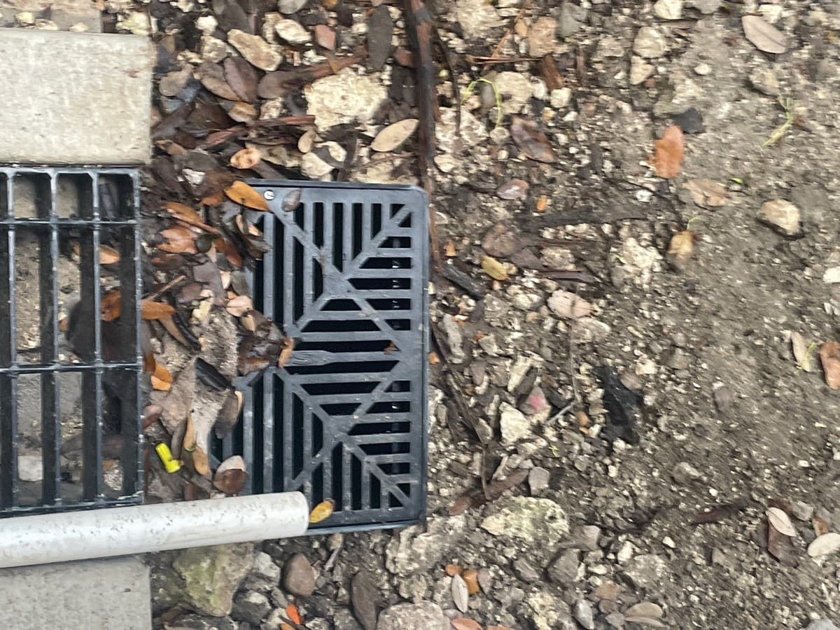 Drainage system comparison chart showing slot drain, French drain, and catch basin application by water volume